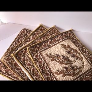 Cushion covers embellished with golden trim